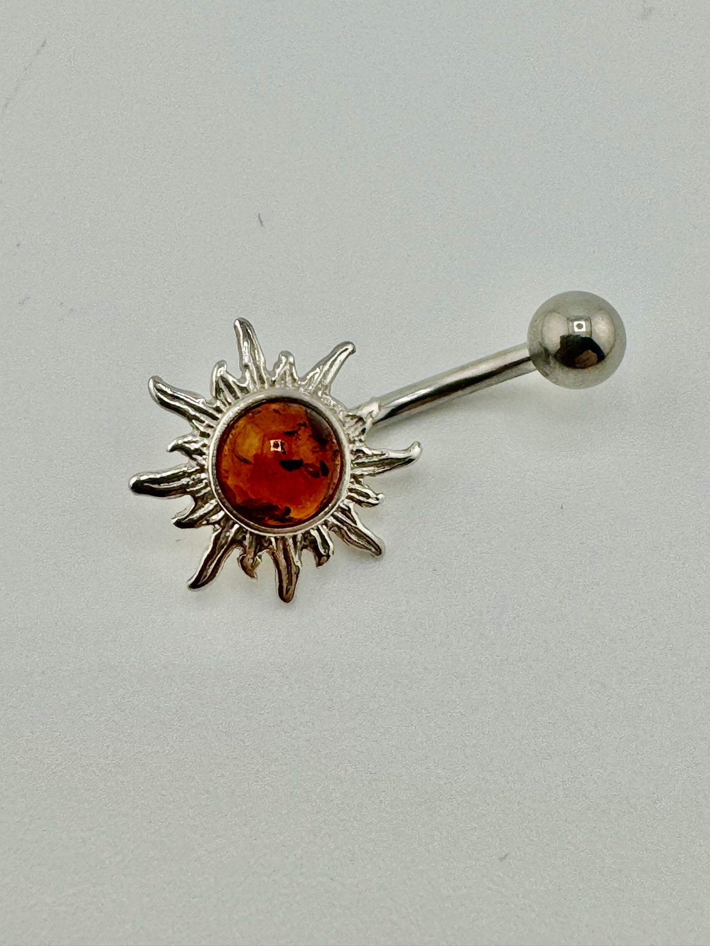 Silver sun piercing with amber - unique piece