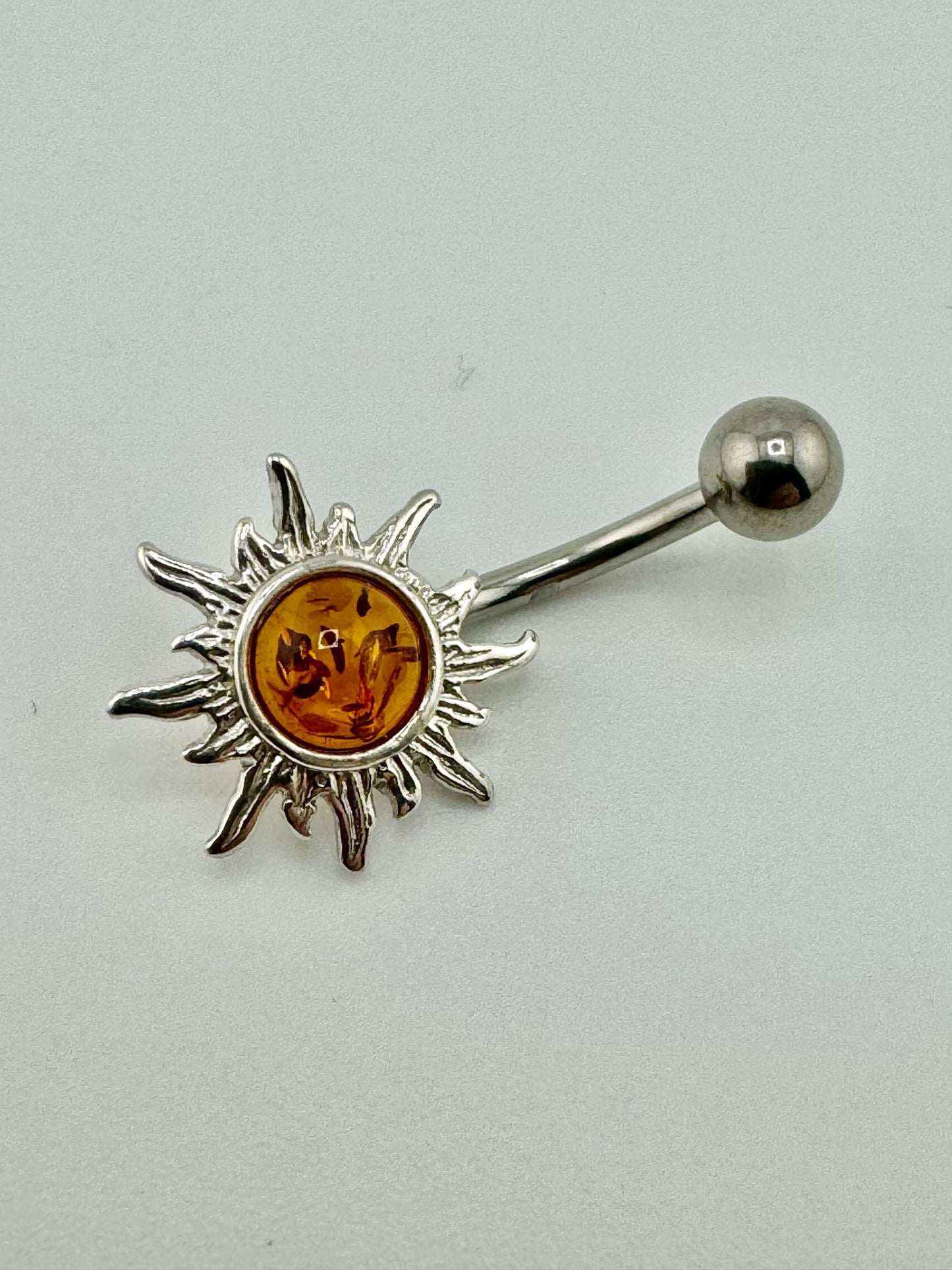 Silver sun piercing with amber - unique piece